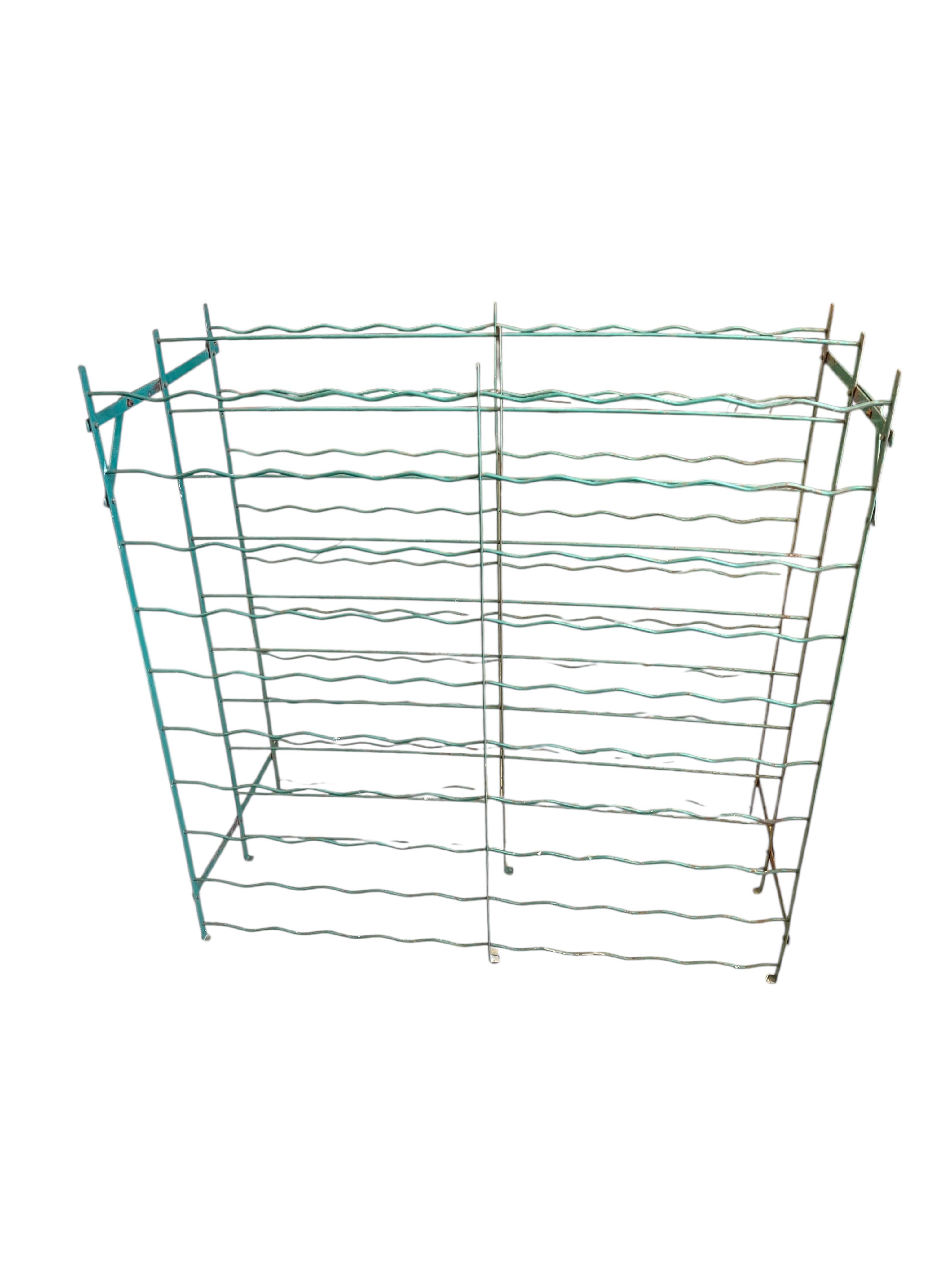 Two French painted wrought iron wine cages, width 101cm, depth 47cm, height 102cm